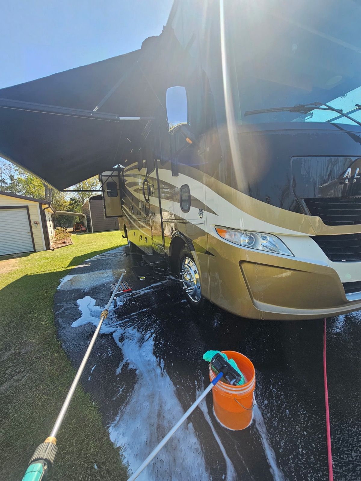 Motorhome being pressure washed