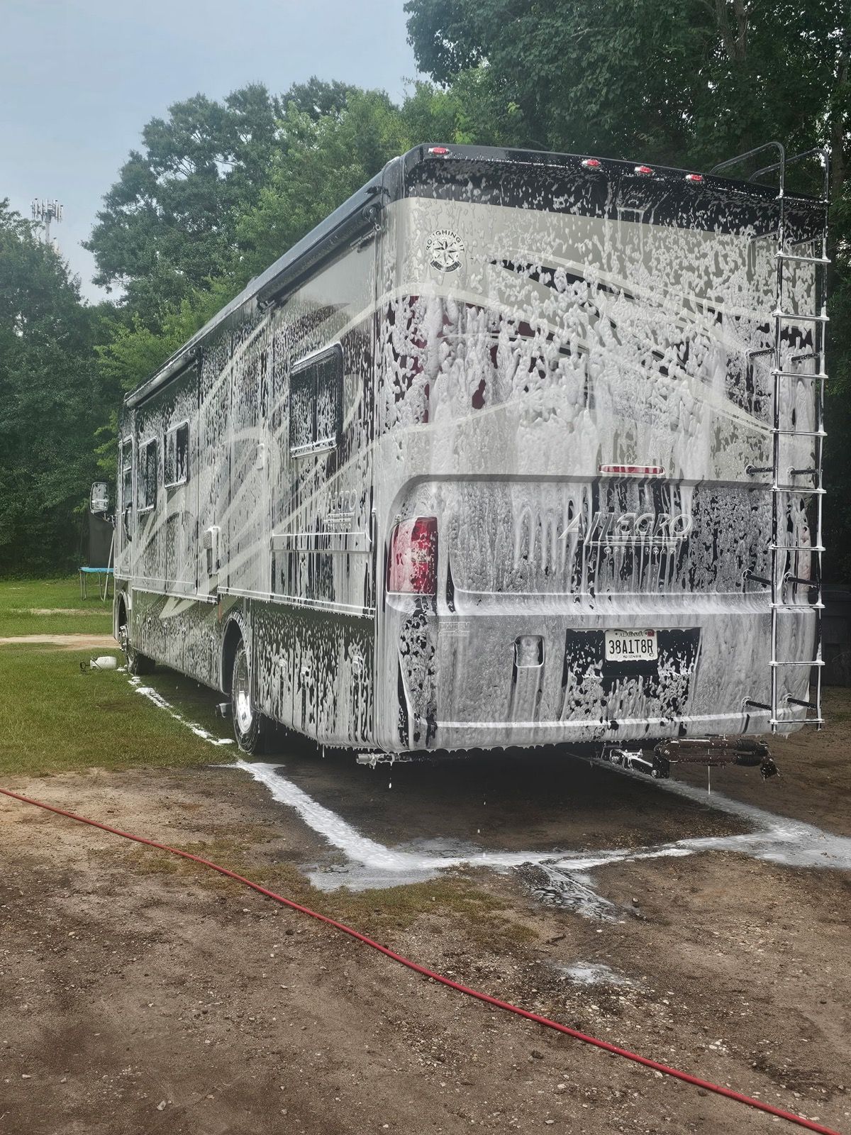 Class A motorhome soaped down