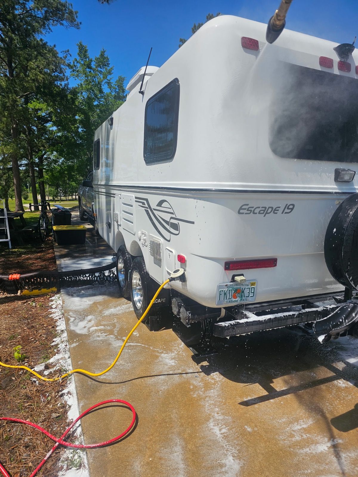 Travel trailer being washed
