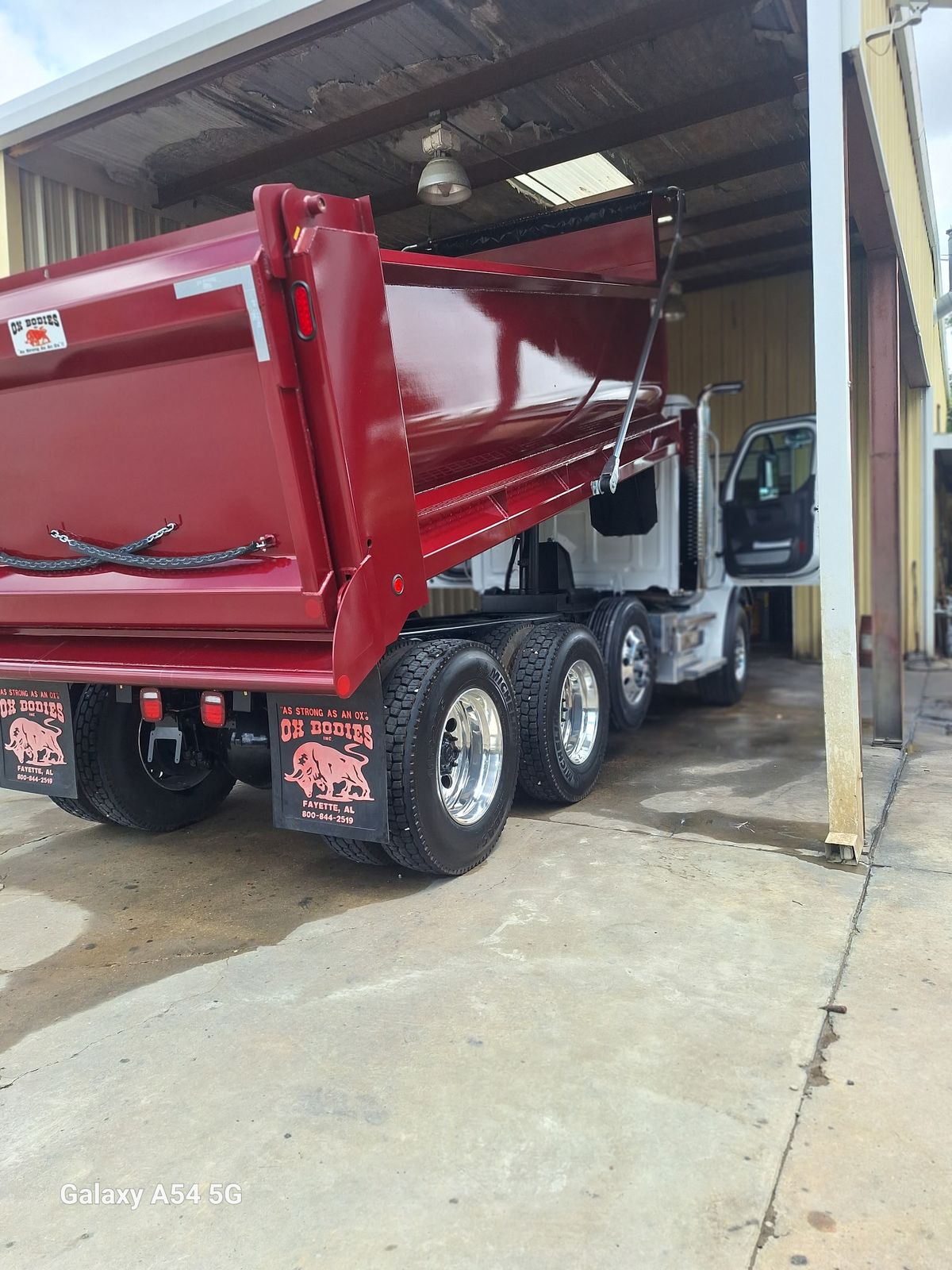 Dump truck rear cleaned and detailed