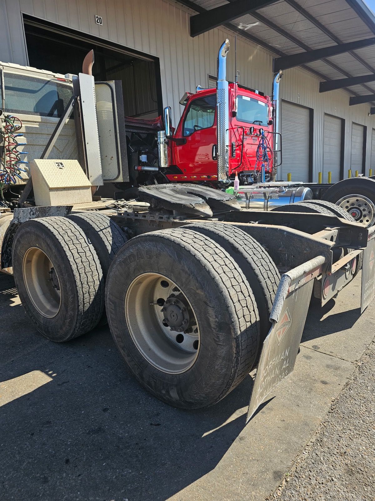 Dump truck axles and wheels cleaned
