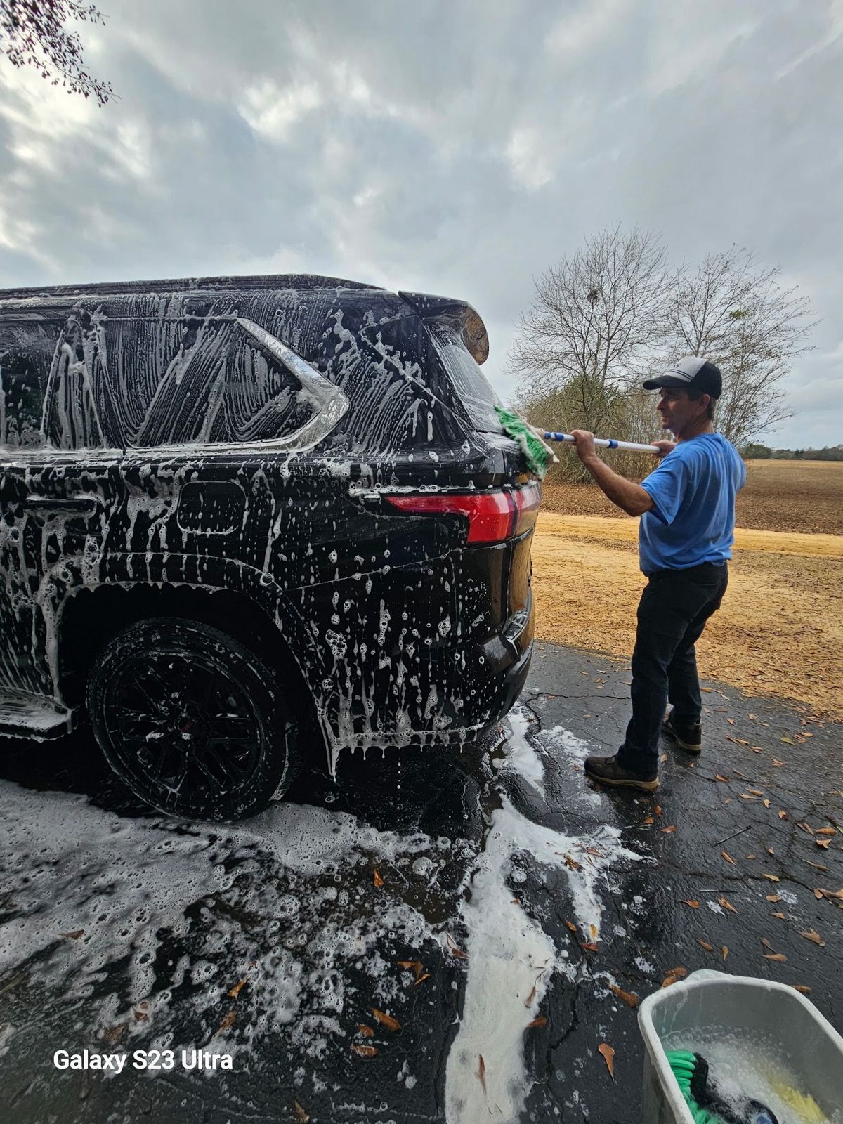 SUV being pressure washed